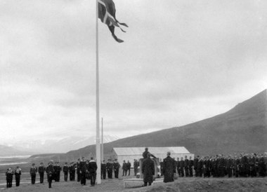 The Norwegian flag is hoisted in Longyearbyen when Norway assumes sovereignty of Svalbard in August 1925.