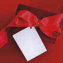 present with red ribbon and card.