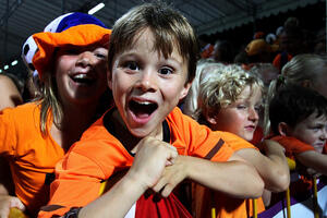 Netherlands supporters cheer as Victoria Cabut of Netherlands score the golden goal during the girls