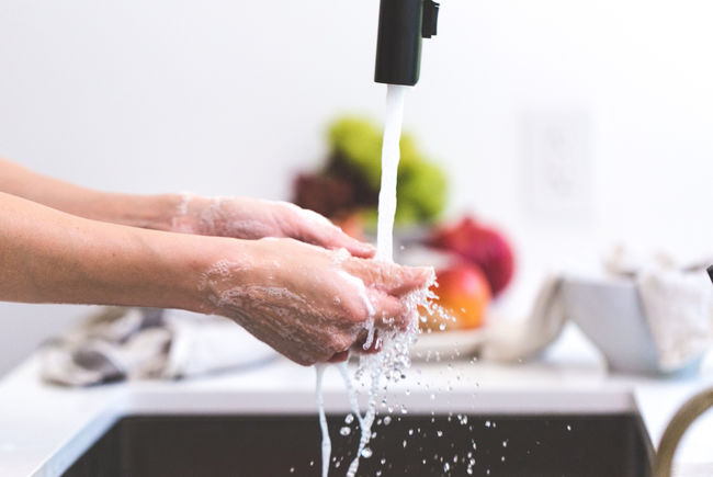 Canva - Person Washing Hands