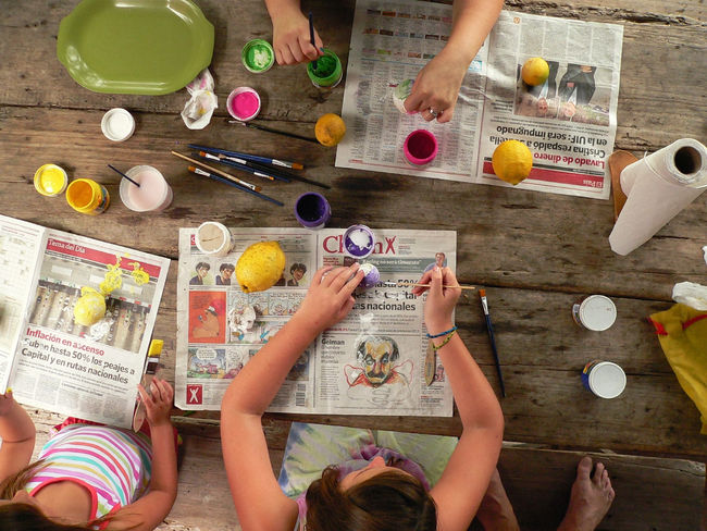 Canva - Kids Painting on a Table