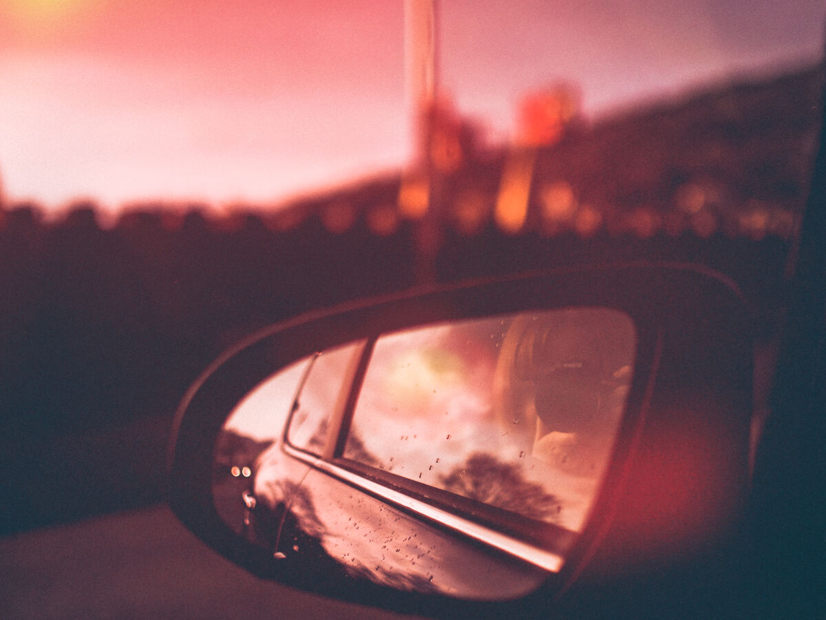 Canva - Close-Up Photography of Side Mirror During Dawn