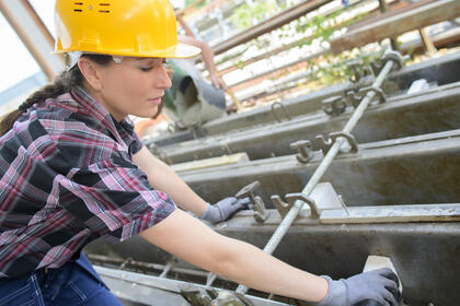 Woman at work on building site