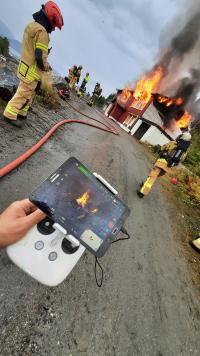 Foto: Heim brann og redning under en øvelse